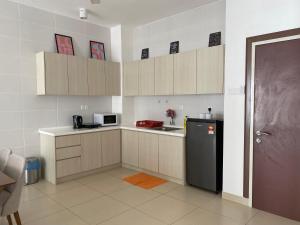 Kjøkken eller kjøkkenkrok på Resort Suite @Midhill Genting