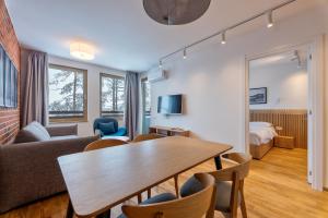 TV a/nebo společenská místnost v ubytování Konak Apartmani & SPA