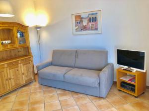 TV a/nebo společenská místnost v ubytování Residenza Ai Ronchi 3 4 7 8