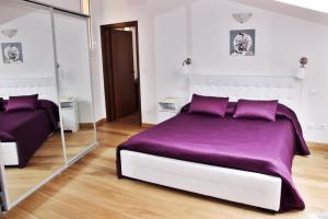 Posteľ alebo postele v izbe v ubytovaní Realkasa Lovin House