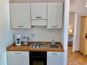Kuchyň nebo kuchyňský kout v ubytování Residenza Ai Ronchi 3 4 7 8