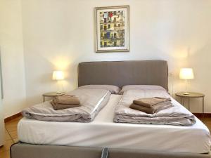 Postel nebo postele na pokoji v ubytování Residenza Ai Ronchi 3 4 7 8 + 20 fotografií