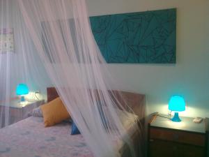 Letto o letti in una camera di Anna Koralli Studios