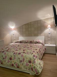 A bed or beds in a room at O Vascetiello