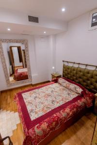 Cama o camas de una habitación en SUAY Apartments