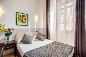 Katil atau katil-katil dalam bilik di Hotel Everest Inn Rome