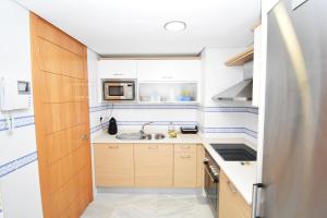 Kuchyň nebo kuchyňský kout v ubytování Expoholidays - Apartamentos Puerto Almerimar