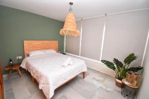 Postel nebo postele na pokoji v ubytování Expoholidays - Apartamentos Puerto Almerimar + 19 fotografií