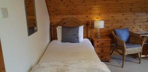 Postel nebo postele na pokoji v ubytování Carn Mhor Bed and Breakfast