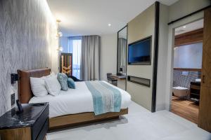 Postel nebo postele na pokoji v ubytování Becquer Hotel Guadalajara