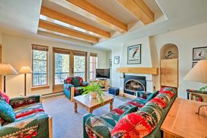 a living room with two couches and a fireplace at Solitude Creekside Condo-Closest to Ski Lift! in Solitude