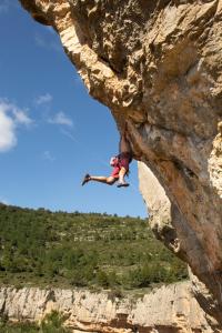 a person is rappelling off of a cliff at Hostal Rural Fidel Garcia Guzman in Chera