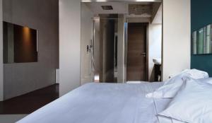 Postel nebo postele na pokoji v ubytování Hotel Locanda del Benaco