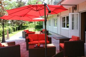 Posezení v ubytování NordWest-Hotel Bad Zwischenahn