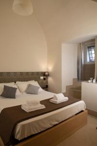 Katil atau katil-katil dalam bilik di Casa Ferretti