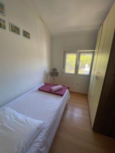 Postel nebo postele na pokoji v ubytování Apartmani Marija