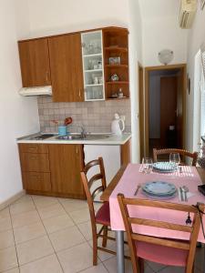 Kuchyň nebo kuchyňský kout v ubytování Apartmani Marija