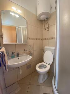Koupelna v ubytování Apartmani Marija + 13 fotografií