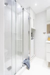 a shower with glass doors in a bathroom at Listen THE STARS 505 - Los cristianos in Los Cristianos