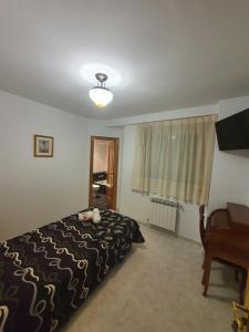 Łóżko lub łóżka w pokoju w obiekcie Pension A Barca