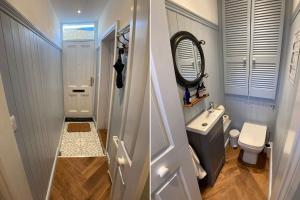 a bathroom with a sink and a toilet and a mirror at Cosy 2 bedroom cottage in Scarborough's Old Town in Scarborough