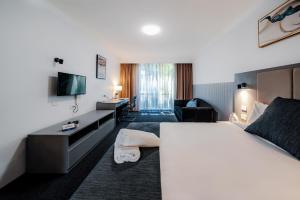 Postel nebo postele na pokoji v ubytování The Select Inn Penrith