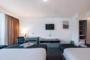 Postel nebo postele na pokoji v ubytování The Select Inn Penrith