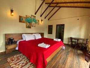 Katil atau katil-katil dalam bilik di Hotel Las Palmeras Gachancipa