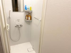 Ένα μπάνιο στο TABISAI HOTEL Suite 博多