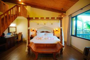 Кровать или кровати в номере Dreams bali Manor