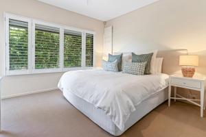 Ένα ή περισσότερα κρεβάτια σε δωμάτιο στο Retreat to tranquillity, Noosa Heads +20 φωτογραφίες
