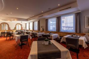 Reštaurácia alebo iné gastronomické zariadenie v ubytovaní The Hotel - himmlisch wohlfühlen