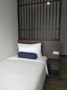 Letto o letti in una camera di Pacific Regency Beach Resort, Port Dickson