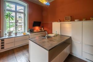 O bucătărie sau chicinetă la Albergo-Toscana