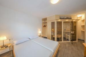 Posteľ alebo postele v izbe v ubytovaní Appartementhaus Chalet Alpina