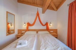Posteľ alebo postele v izbe v ubytovaní Appartementhaus Chalet Alpina