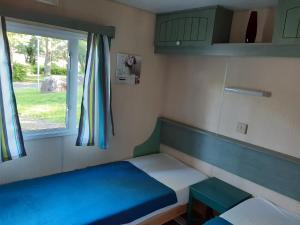 Camping Etang Du Camp客房内的一张或多张床位