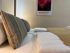 Posteľ alebo postele v izbe v ubytovaní ABT Apartments