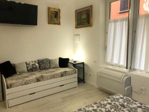 Łóżko lub łóżka w pokoju w obiekcie Appartamento House Apartment Tabe Centro Bologna