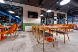 Restoran või mõni muu söögikoht majutusasutuses Konak Apartmani & SPA
