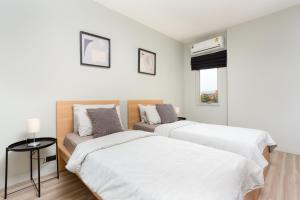 Кровать или кровати в номере Studio 365 Serviced Apartments