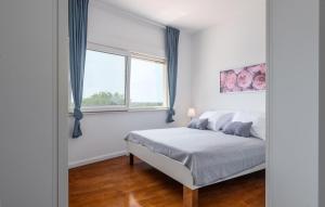 Voodi või voodid majutusasutuse Villa Smile toas