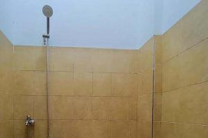 Ένα μπάνιο στο KoolKost Syariah At Komplek PLN Balikpapan