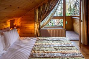Postel nebo postele na pokoji v ubytování Hutor Hotel + 28 fotografií
