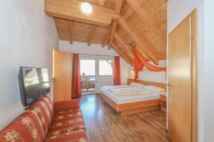 Posteľ alebo postele v izbe v ubytovaní Appartementhaus Chalet Alpina