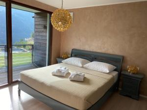 Posteľ alebo postele v izbe v ubytovaní VILLA COLLINA VERDE + 37 fotografií
