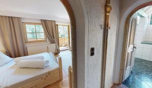 A bed or beds in a room at Appartement Hauser