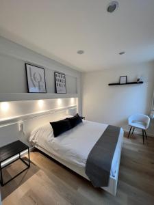Letto o letti in una camera di Beaux ARTS