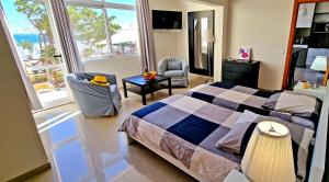 A bed or beds in a room at Ferienwohnung LILLY - Costa Calma - Pool - Meerblick