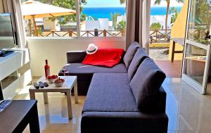 A seating area at Ferienwohnung LILLY - Costa Calma - Pool - Meerblick